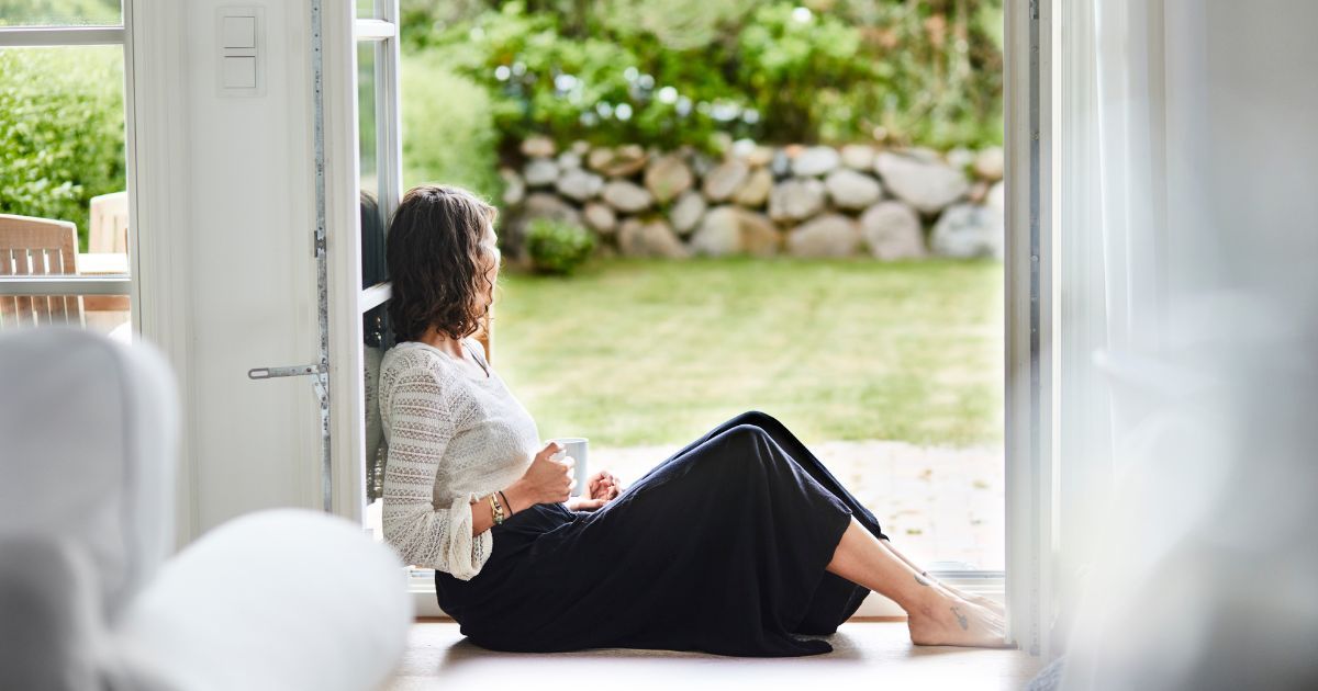 Coming off the pill: A woman looking out of the window