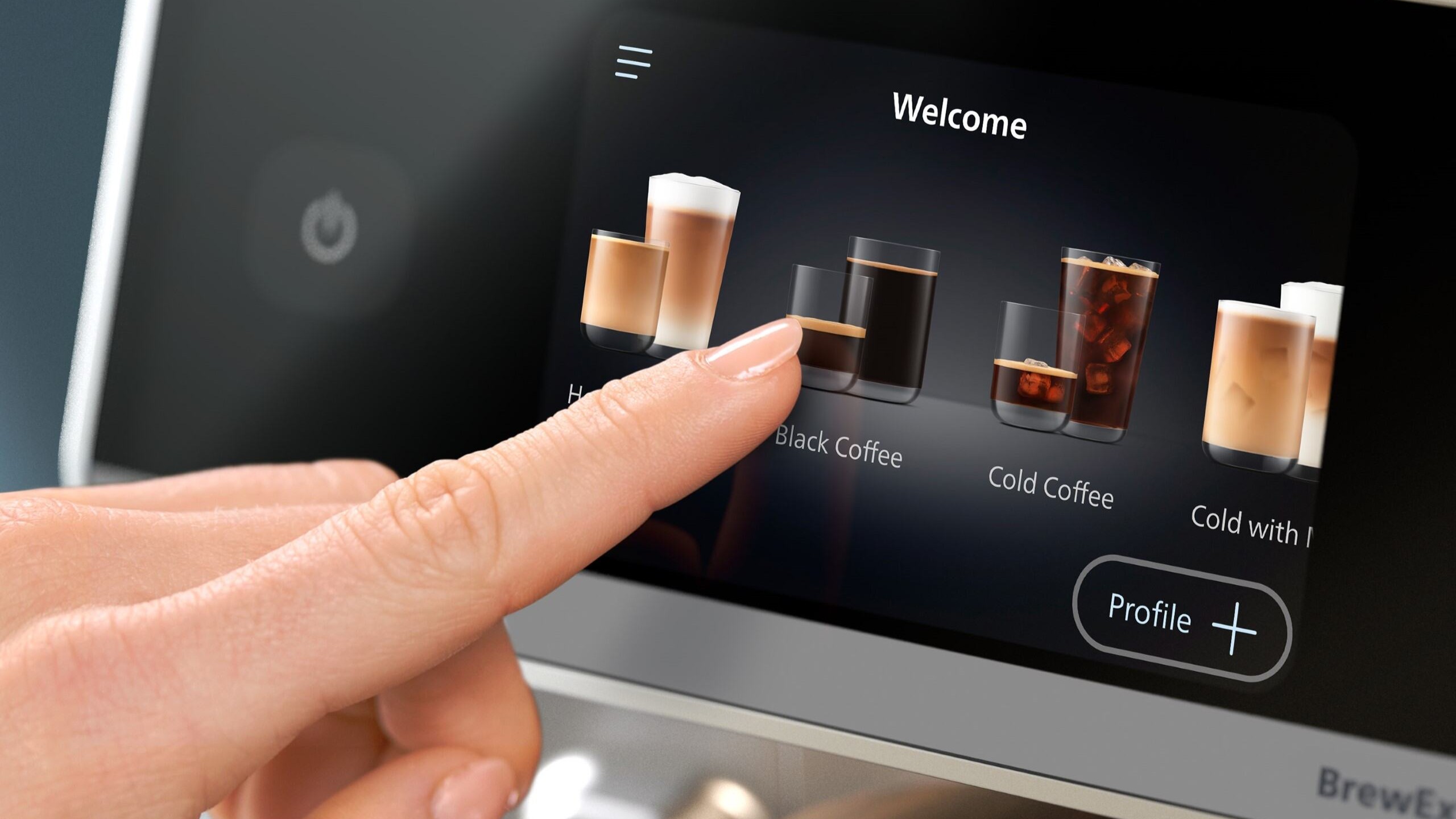 Person selecting drink from Philips Caf&eacute; Aromis coffee maker menu