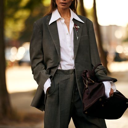 Woman holding a fall bag