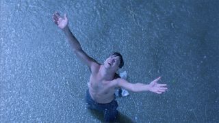 Tim Robbins free in the rain in The Shawshank Redemption