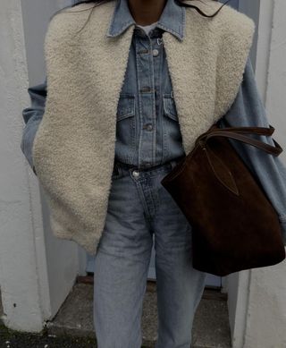 @_jessicaskye wearing double denim and shearling vest