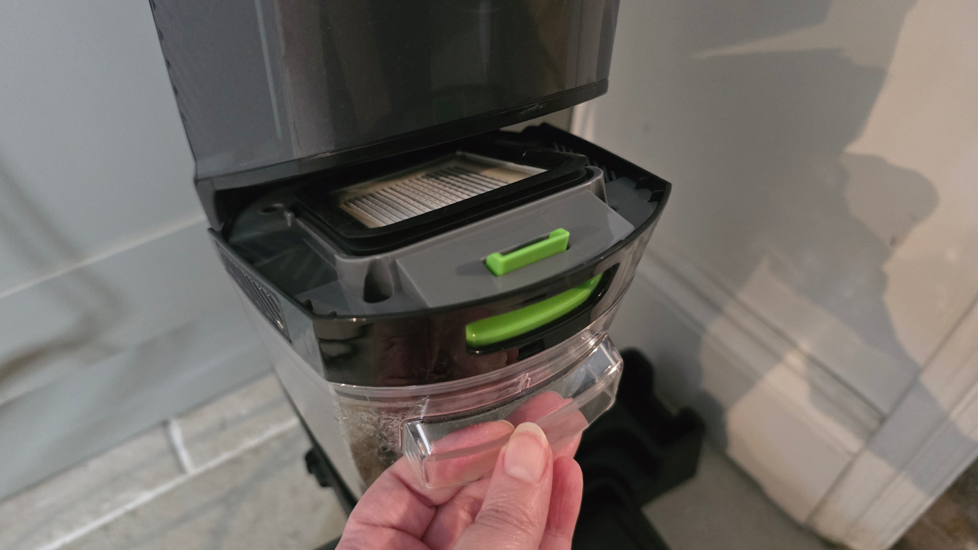 Bissell CrossWave HydroSteam Pet removing the dirty water tank