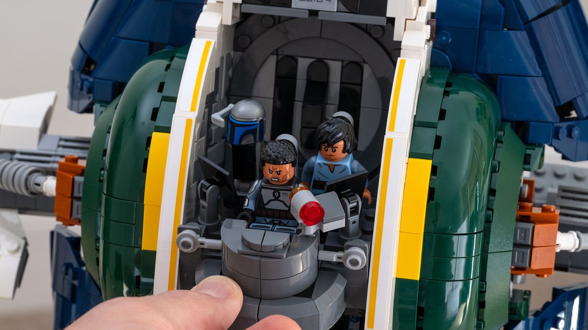 Lego Star Wars UCS Jango Fett&rsquo;s Firespray-Class Starship (75409) cockpit with canopy open and hand removing bridge