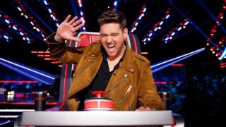 Michael Buble smashes his button in animated fashion on The Voice Season 28.