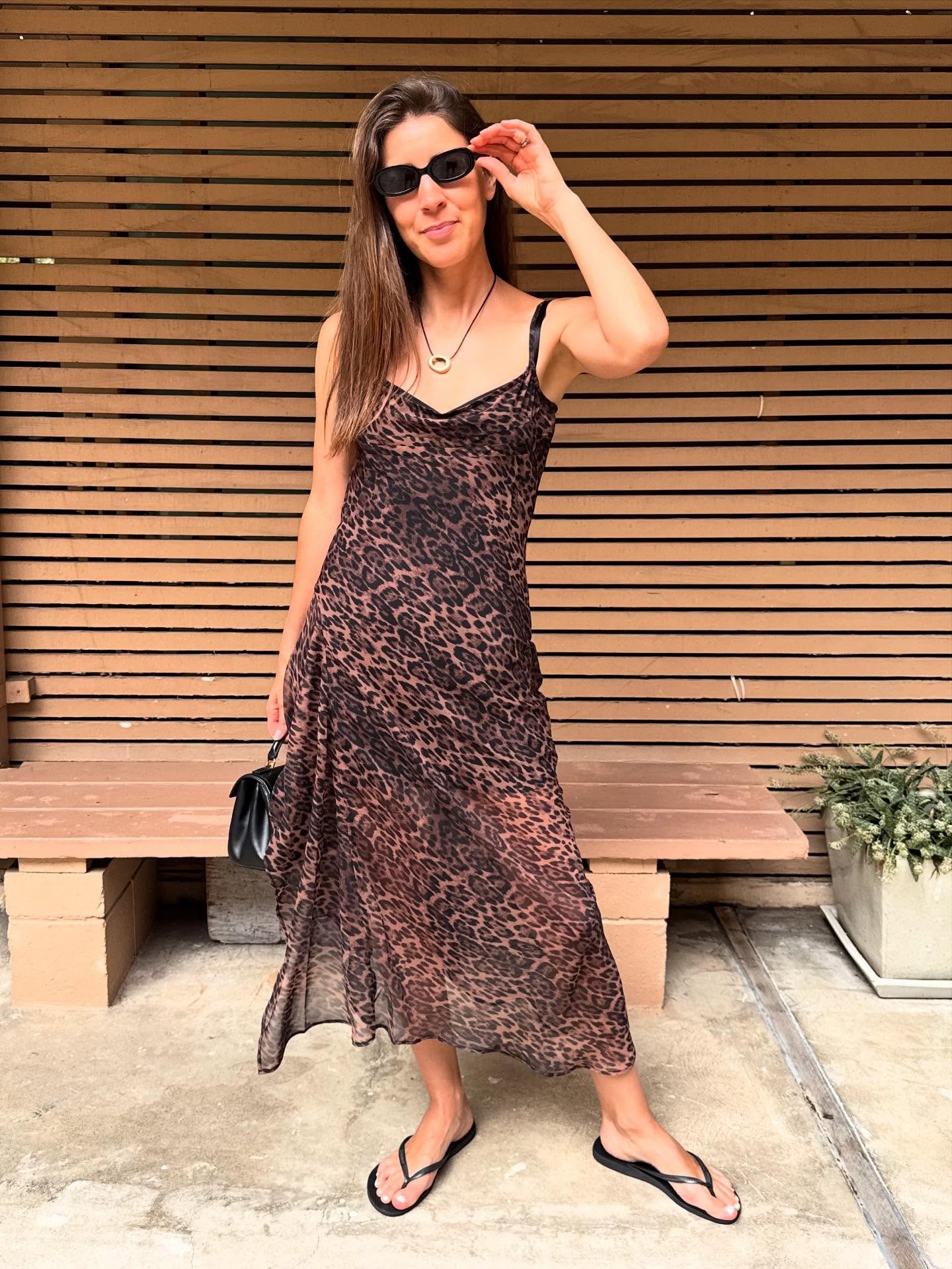 Woman in sheer leopard print dress