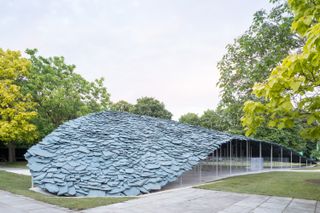 serpentine pavilion 2019 by ishigami with slate roof help up by slim poles