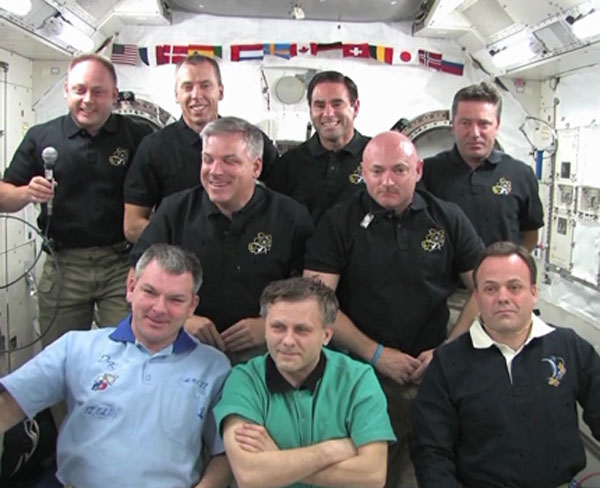 The STS-134 of Endeavour and station&#039;s Expedition 27 crews participate in the joint crew news conference aboard the International Space Station on May 26, 2011