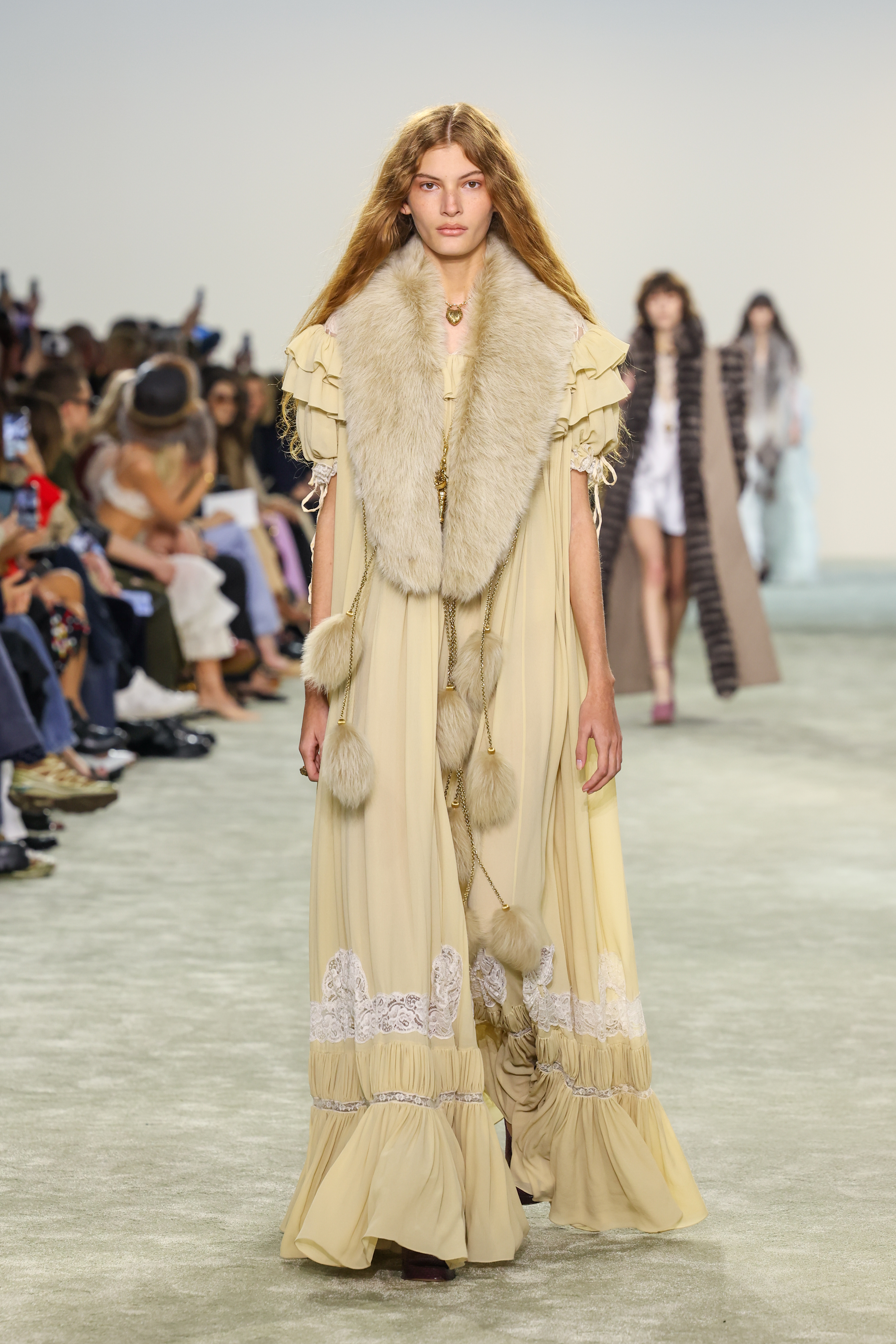 PARIS, FRANCE - MARCH 06: A model walks the runway during the Chloe Womenswear Fall/Winter 2025-2026 show as part of Paris Fashion at Tennis Club de Paris on March 06, 2025 in Paris, France. (Photo by Peter White/Getty Images)