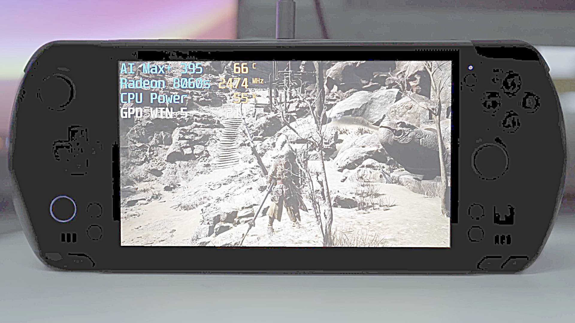 GPD WIN 5 handheld with lighting levels increased to reveal darkened body, buttons, and controls.