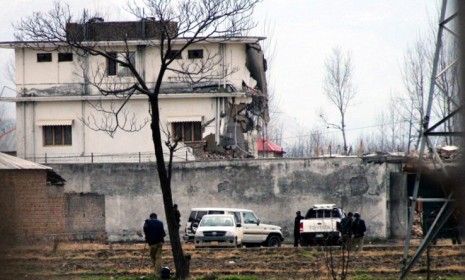 Pakistani police officers stand guard outside Osama bin Laden&amp;#039;s old compound