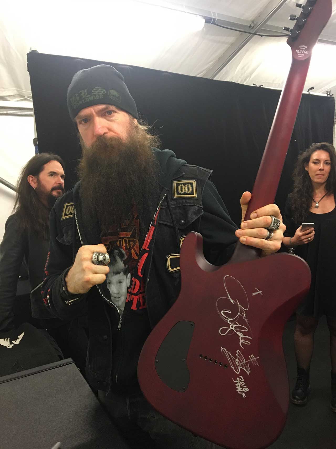 Zakk Wylde with signed guitar