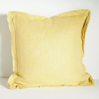 yellow throw pillow