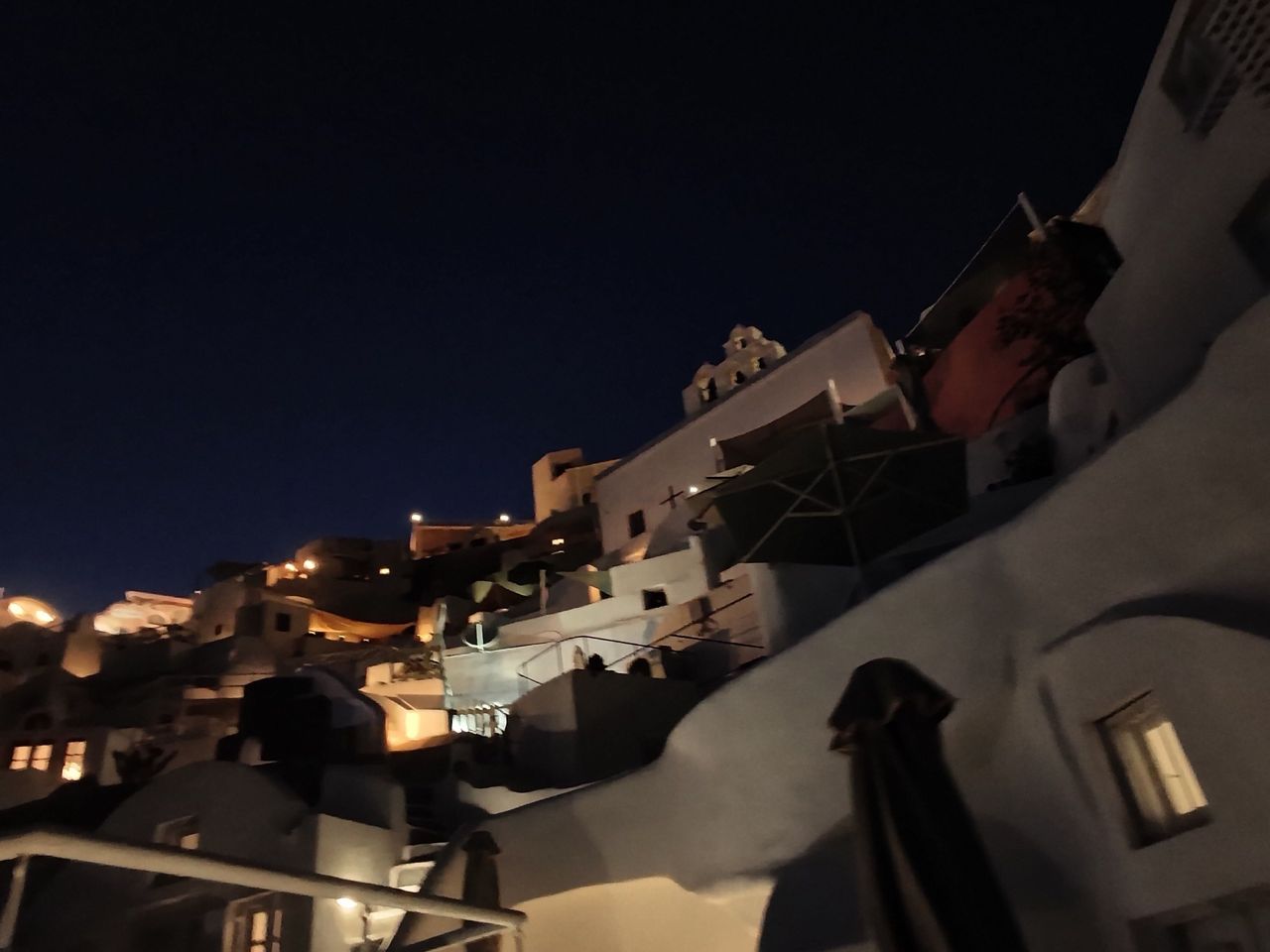 Test shots taken on the L'Atitude 52 smart glasses showing the view at night from our balcony
