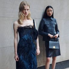 Two models wearing outfits from Bergdorf Goodman.