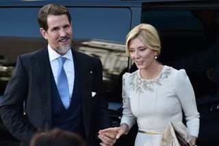 Crown Prince Pavlos, Crown Princess Marie-Chantal arrive at the Athens Orthodox Cathedral following the wedding ceremony of Nina Flohr and Prince Philippos at the Metropolis Greek Orthodox Cathedral on October 23, 2021 in Athens, Greece.