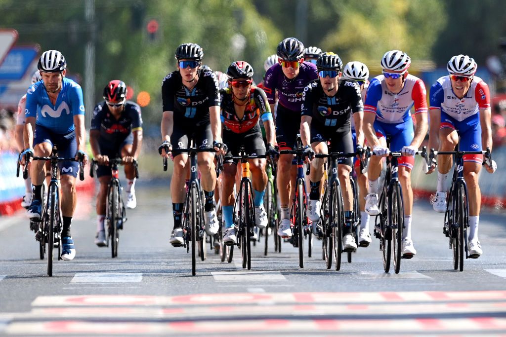 CORDOBA SPAIN AUGUST 26 LR Jose Joaquin Rojas Gil of Spain and Movistar Team Thymen Arensman of Netherlands and Team DSM Yukiya Arashiro of Japan and Team Bahrain Victorious Jetse Bol of Netherlands and Team Burgos BH Nico Denz of Germany and Team DSM and Ramon Sinkeldam of Netherlands and Team Groupama FDJ cross the finishing line during the 76th Tour of Spain 2021 Stage 12 a 175 km stage from Jan to Crdoba lavuelta LaVuelta21 on August 26 2021 in Cordoba Spain Photo by Stuart FranklinGetty Images