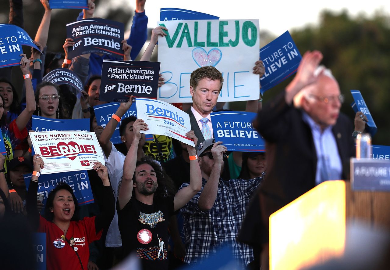 A sad Rand Paul amid Bernie Sanders supporters.