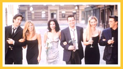 A promotional poster of the Friends cast 2000 walking down the street, with a yellow border around the image