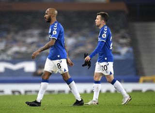 Everton’s Fabian Delph and Bernard leave the pitch