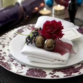 plate with napkin and flower