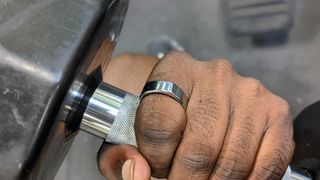 Wearing the Oura Ring (Gen 3) while holding a barbell