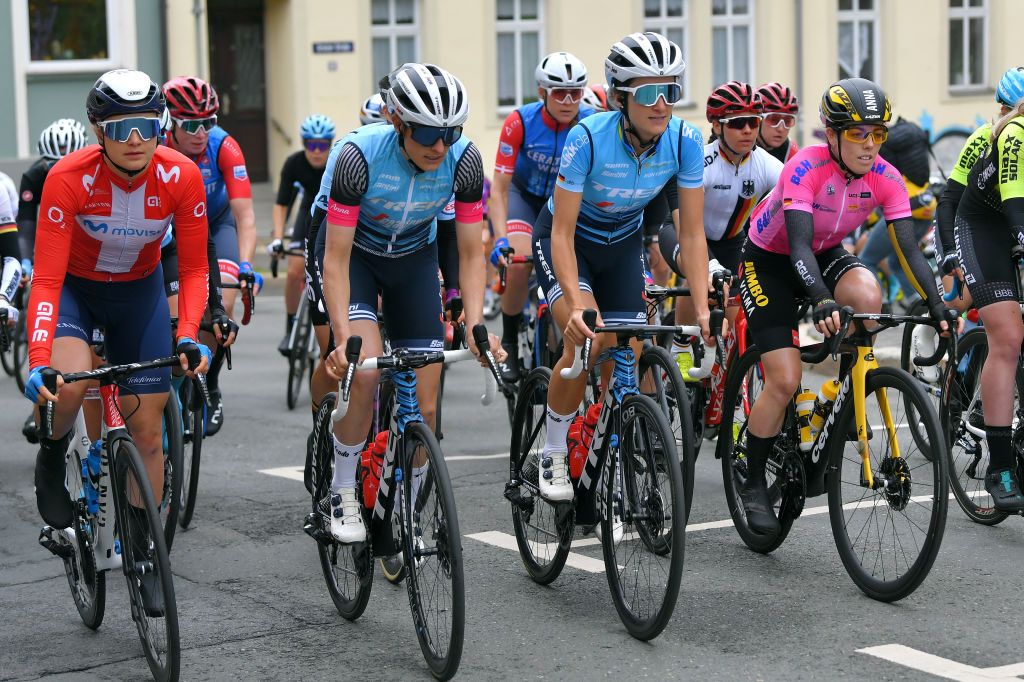 GERA GERMANY MAY 26 Emma Norsgaard Jorgensen of Denmark and Movistar Team Lucinda Brand of Netherlands and Trek Segafredo stage winner jersey Elisabeth DeignanArmitstead of United Kingdom and Trek Segafredo blue most active rider jersey Anna Henderson of United Kingdom and Jumbo Visma Team Purple sprint jersey during the 34th Internationale LOTTO Thringen Ladies Tour 2021 Stage 2 a 1251km stage from Gera to Gera ltlt2021 lottothueringenladiestour womencycling on May 26 2021 in Gera Germany Photo by Luc ClaessenGetty Images