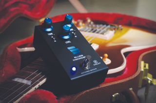 Keeley Electronics' Blues Disorder pedal, set against a Gibson Les Paul