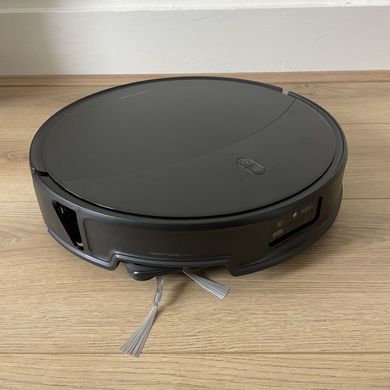 Roborock Saros 20 Robot Vacuum bot sitting on wood-effect flooring