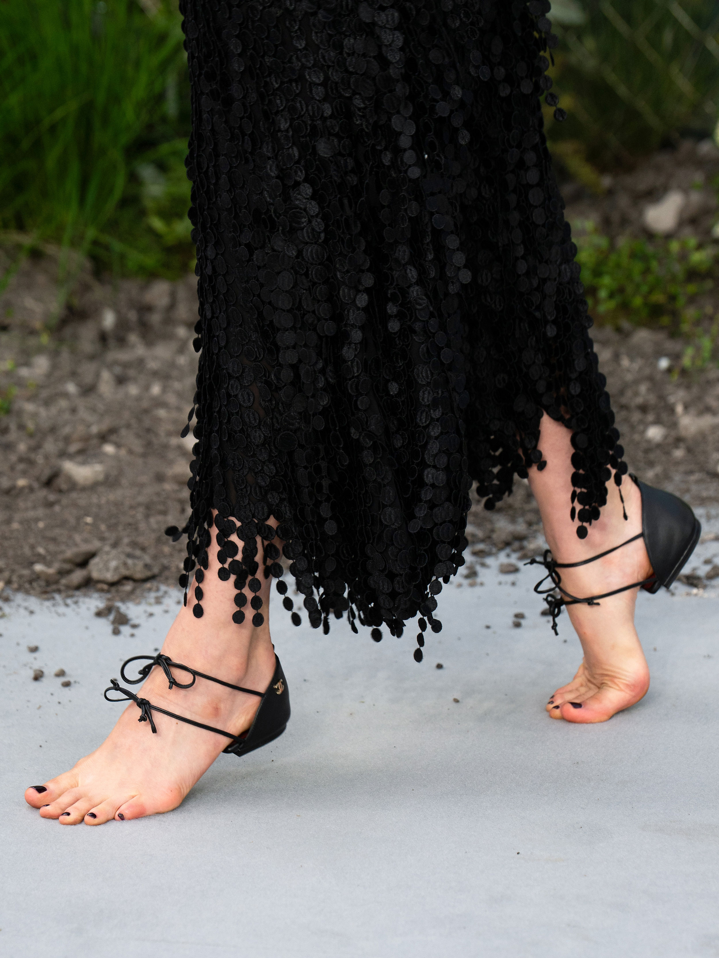 Margaret Qualley wears Chanel barefoot sandals on the red carpet