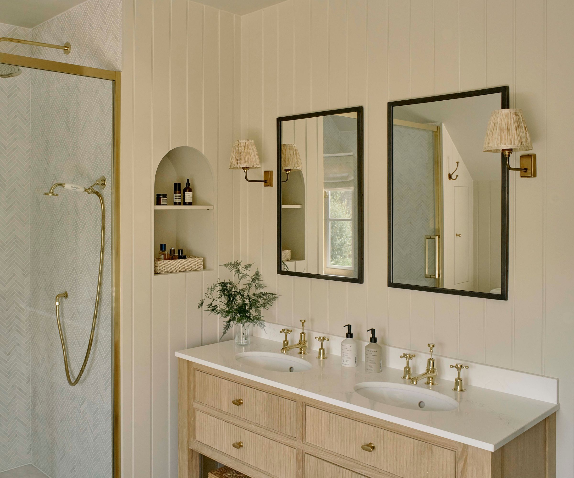 Wooden bathroom vanity with fluted details