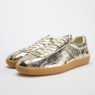 Gold metallic trainers from Zara