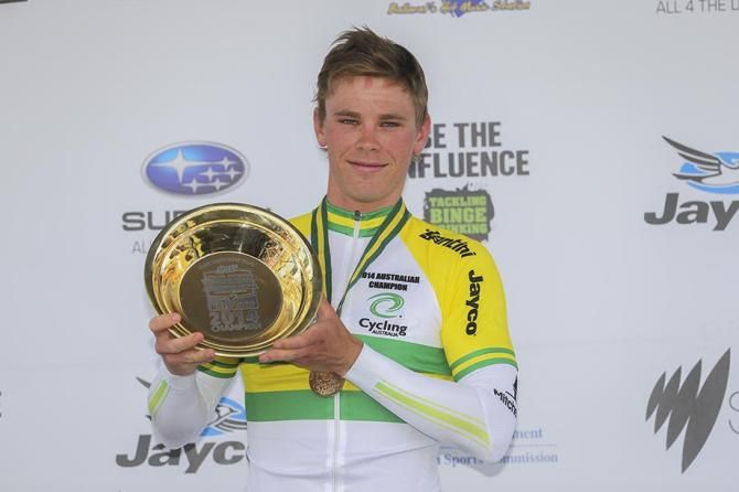 Michael Hepburn showing his prize to the audience