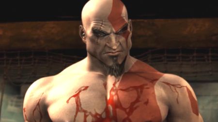 God of War protagonist Kratos, splattered in blood, looks pensive