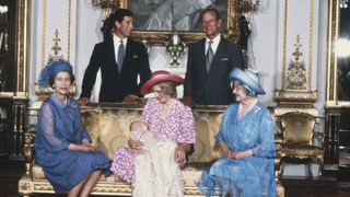 Diana, Princess of Wales holding her son Prince William with Charles, Prince of Wales, Prince Philip the Duke of Edinburgh, Queen Elizabeth II and the Queen Mother at Buckingham Palace after Prince William's christening ceremony