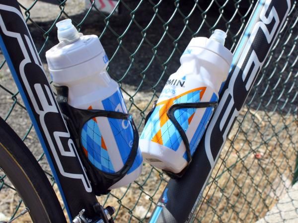 While many other teams swapped to aluminum bottle cages, Garmin-Transitions' Arundel Mandible carbon holders grasp tightly enough to use on the cobbles.