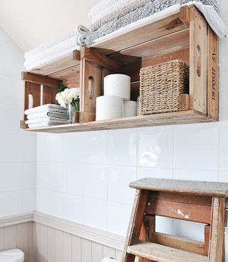 bathroom with attached open shelves