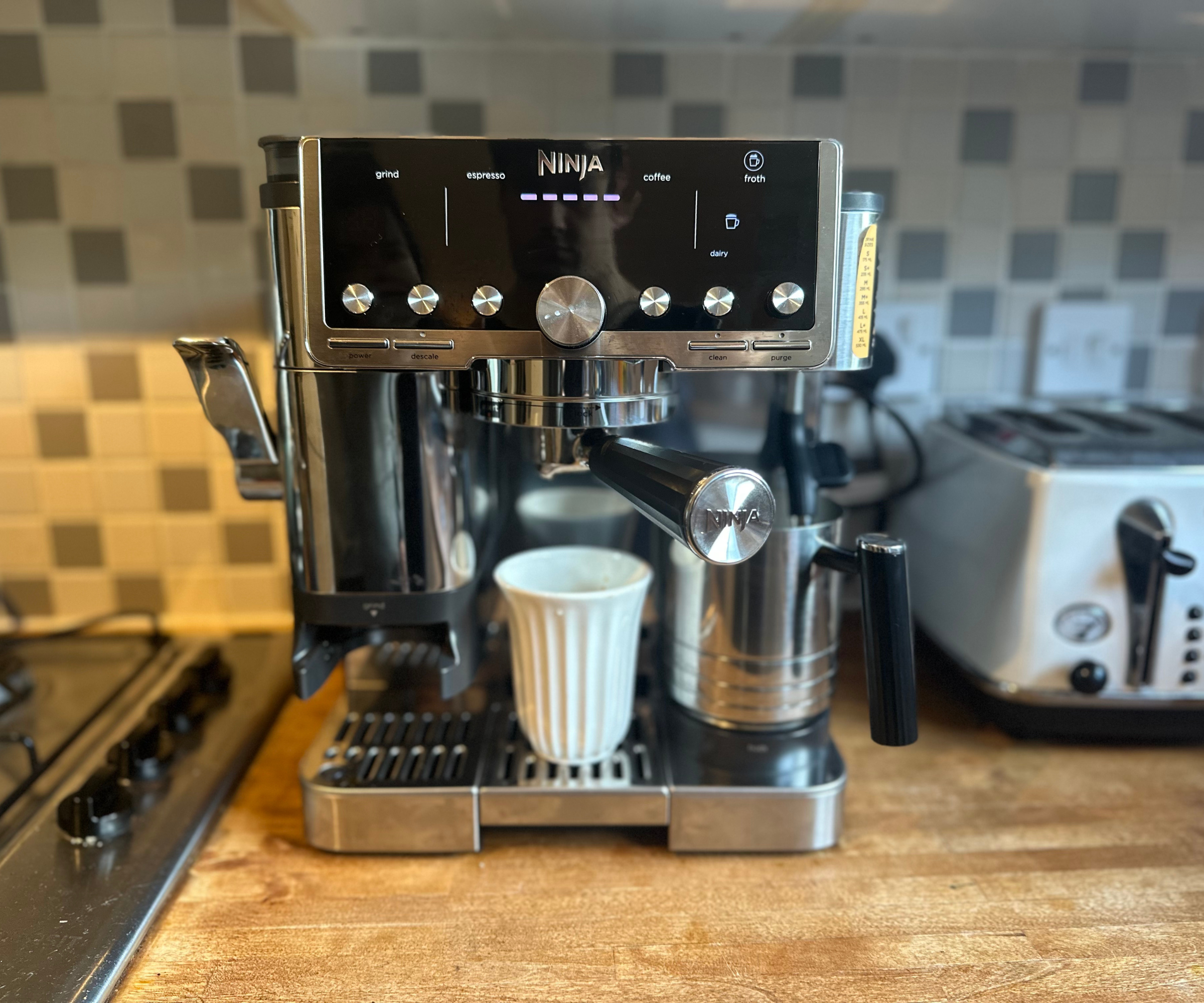 Making a flat white in the Ninja Luxe Café Premier this morning