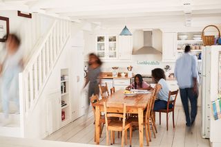 Family inside their kitchen