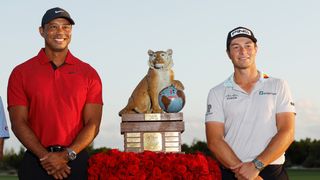 Tiger Woods and Viktor Hovland with the trophy after Hovland's Hero World Challenge win