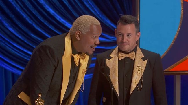 Travon Free (left) and Martin Desmond Roe win the Oscar for live action short film for 'Two Distant Strangers'