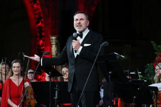 David Walliams giving a speech in a tuxedo