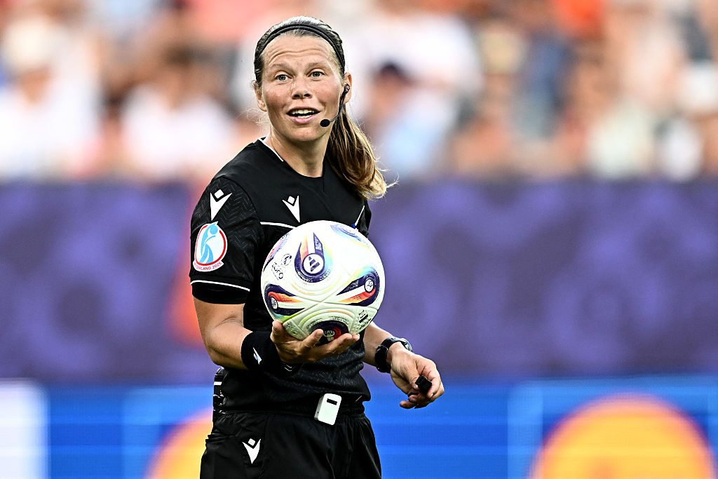 Danish Referee Frida Klarlund holds the ball during the UEFA Women&#039;s Euro 2025 Group D football match between Wales and The Netherlands at the Allmend Stadion Luzern in Lucerne on July 5, 2025.