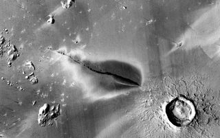 A satellite image of a recent explosive volcanic deposit around a fissure of the Cerberus Fossae system on Mars.