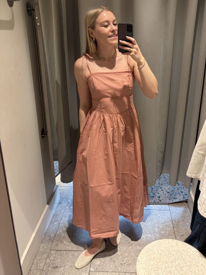 Woman wears pink dress from H&amp;amp;M