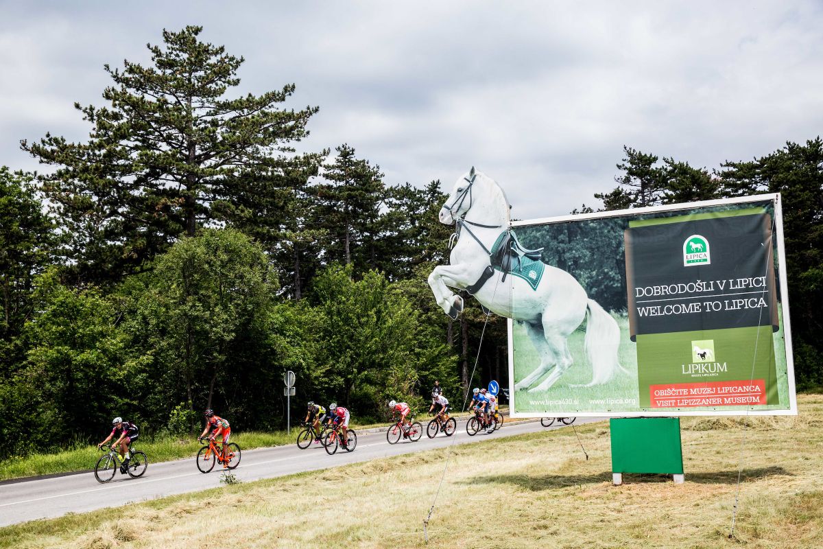 Riders try to get clear off the front of the peloton