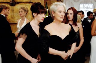 Anne Hathaway, Meryl Streep and Emily Blunt act in a scene from The Devil Wears Prada