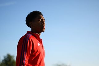 Myles Lewis-Skelly of Arsenal walks onto the pitch prior to the Premier League 2 match between Arsenal U21 and Manchester United U21 at Meadow Park on August 16, 2024 in Borehamwood, England.