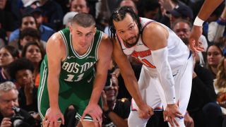 Payton Pritchard #11 of the Boston Celtics and Jalen Brunson #11 of the New York Knicks look on during the game during Round Two of the 2025 NBA Playoffs at Madison Square Garden in New York City, New York, ahead of Knicks vs Celtics Game 6 