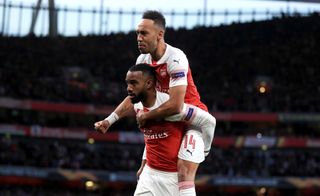 Alexadre Lacazette (bottom) and Pierre-Emerick Aubameyang have forged a fine understanding at Arsenal.