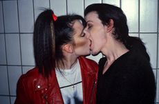 Julia and Bruce outside Planets, London, 1980 by Derek Ridges from Gucci London book